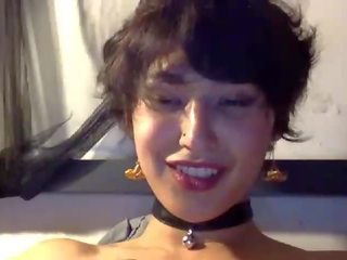 Perky Ms in belled choker orgasms intensely